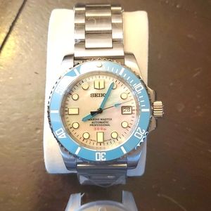 Fully custom Seiko mod mother of pearl dial with Tiffany Blue bezel